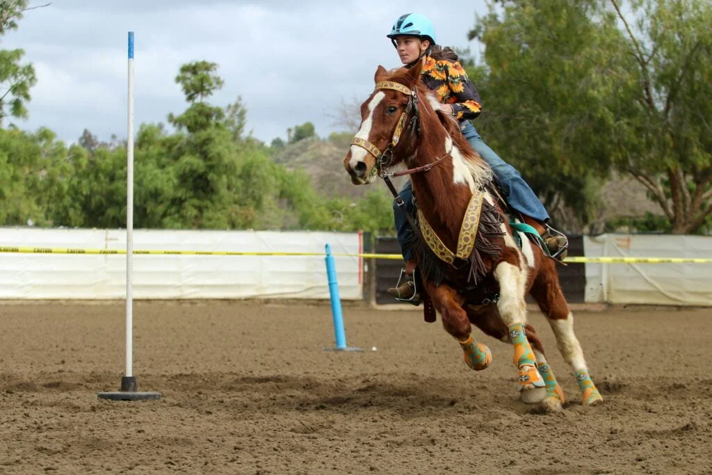 Girl competing in a horse show event.