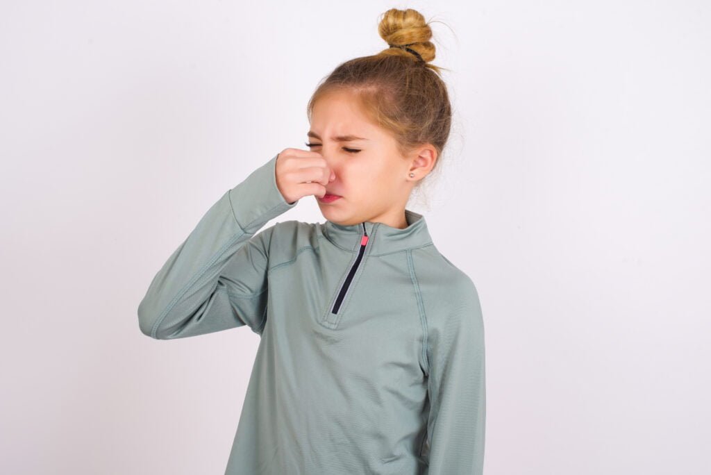 Removing old sweat odors from polyester riding clothes