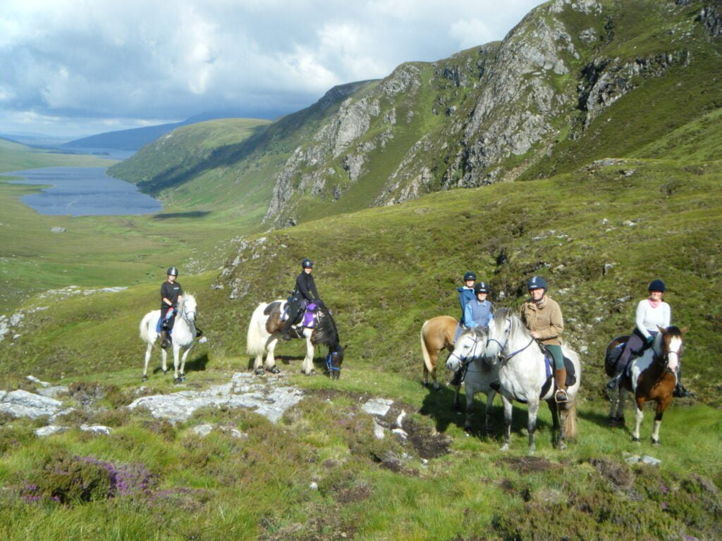 Horseback riding though the Scottish highlands